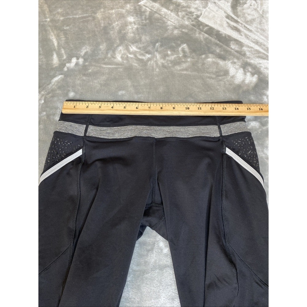 Lululemon Run a Marathon Crop Pant Size 10 Black Side Pockets Reflective Stripes - Picture 6 of 8